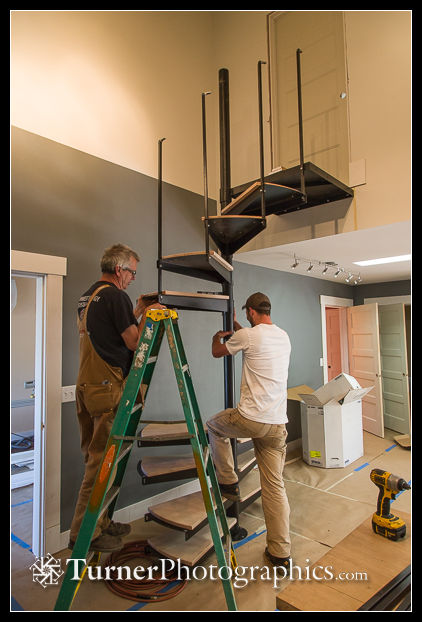 Mike Gill and Matt attach spiral staircase treads