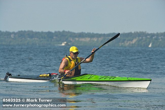 0503525 Woodcraft Wood Floors (10) kayaker Charles Look paddles to finish, Sea to Ski Race. Bellingham, WA. © Mark Turner