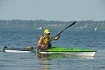 0503525 Woodcraft Wood Floors (10) kayaker Charles Look paddles to finish, Sea to Ski Race. Bellingham, WA. © Mark Turner