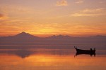 9709129 Pre-sunrise glow over Mt. Baker & Twin Sisters reflected in Bellingham Bay w/ small fishing boat. Lummi Shore Rd, WA. © Mark Turner