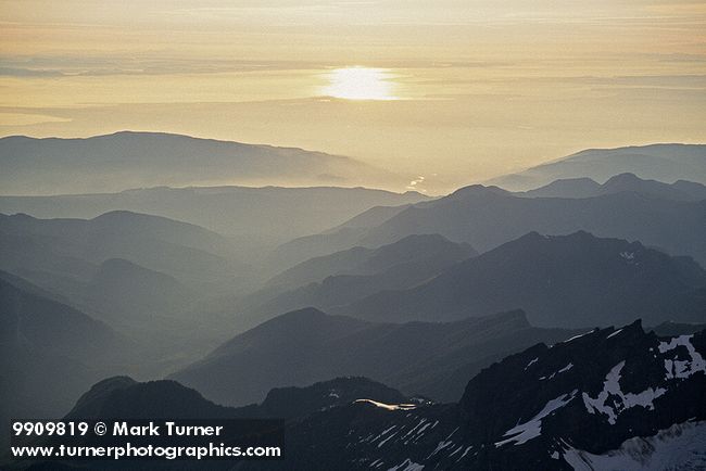 9909819 Cascade Foothills & Nooksack R valley w/ afternoon haze, aerial fr E 9,000'. Whatcom Co., WA. © Mark Turner