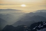 9909819 Cascade Foothills & Nooksack R valley w/ afternoon haze, aerial fr E 9,000'. Whatcom Co., WA. © Mark Turner