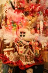 0910577 Mask & gingerbread house ornaments on Gingerbread & Candy Christmas tree. Mary Etta Foster, Ferndale, WA. © Mark Turner