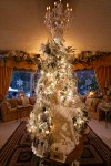 0910607 Silver Christmas tree w/ classical nymph statue in living room. Mary Etta Foster, Ferndale, WA. © Mark Turner