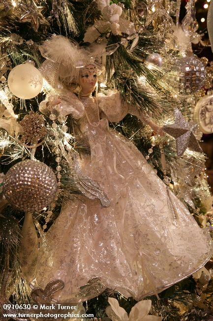 0910630 Angel in white gown on Silver Christmas tree. Mary Etta Foster, Ferndale, WA. © Mark Turner