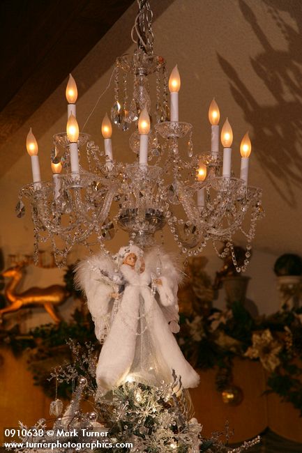 0910638 Chandelier & angel atop Silver Christmas tree. Mary Etta Foster, Ferndale, WA. © Mark Turner