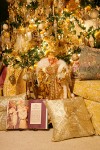 0910671 Doll in gold dress among pillows & book at base of Gold Christmas tree. Mary Etta Foster, Ferndale, WA. © Mark Turner