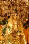 0910677 Chandelier & angel doll atop Gold Christmas tree. Mary Etta Foster, Ferndale, WA. © Mark Turner