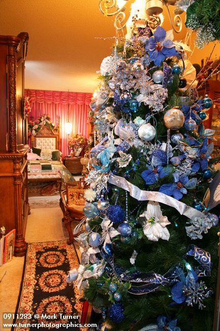 0911283 Blue Christmas tree in bedroom. Mary Etta Foster, Ferndale, WA. &copy; Mark Turner
