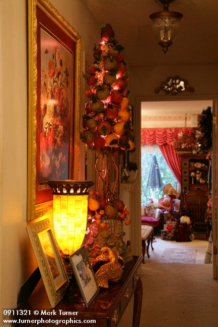 0911321 Fruit tabletop Christmas tree in hallway. Mary Etta Foster, Ferndale, WA. &copy; Mark Turner