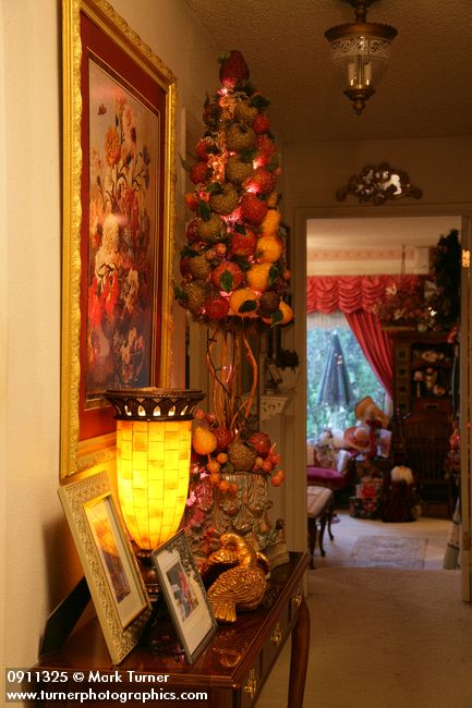 0911325 Fruit tabletop Christmas tree in hallway. Mary Etta Foster, Ferndale, WA. &copy; Mark Turner
