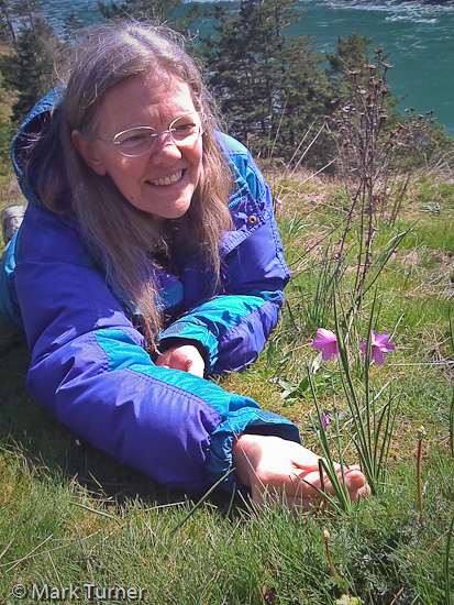 Kay examines grass widows on Pass Island.