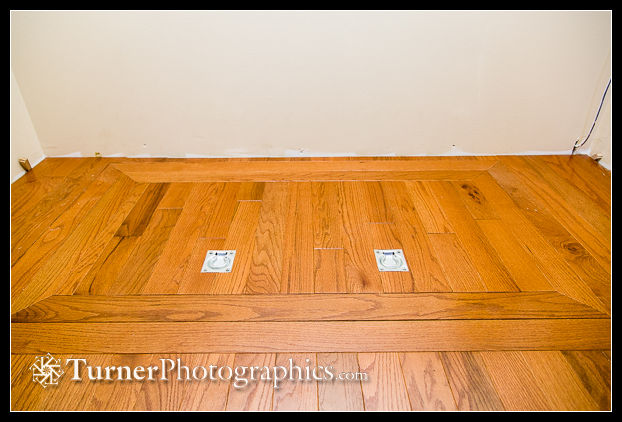 Crawl space hatch in camera room closet floor.