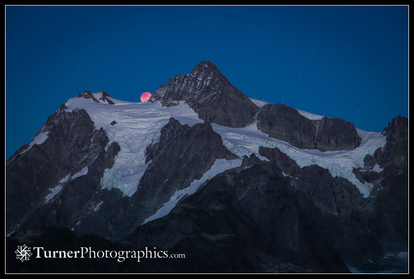 Lunar eclipse rising over Mt. Shuksan