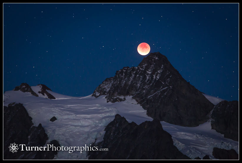 Lunar eclipse rising over Mt. Shuksan