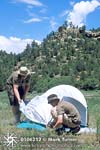 Pitching tent at Anasazi camp.